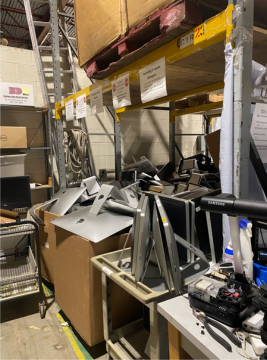Storage warehouse with many various monitors and electronics