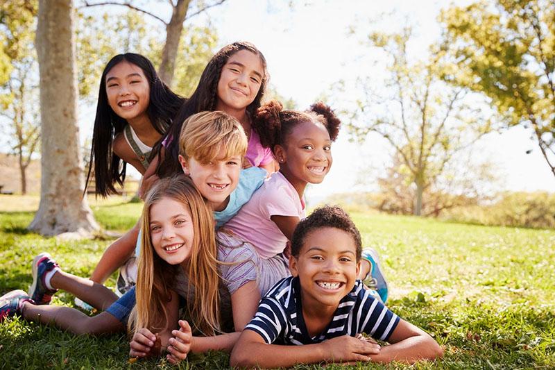 Kids in a playground, diverse, park, canva image